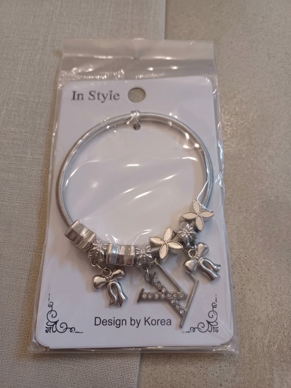 Brand New Silver Charm Bracelet with Bow and Star Accents